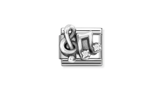 Treble Clef & Music Note symbol.